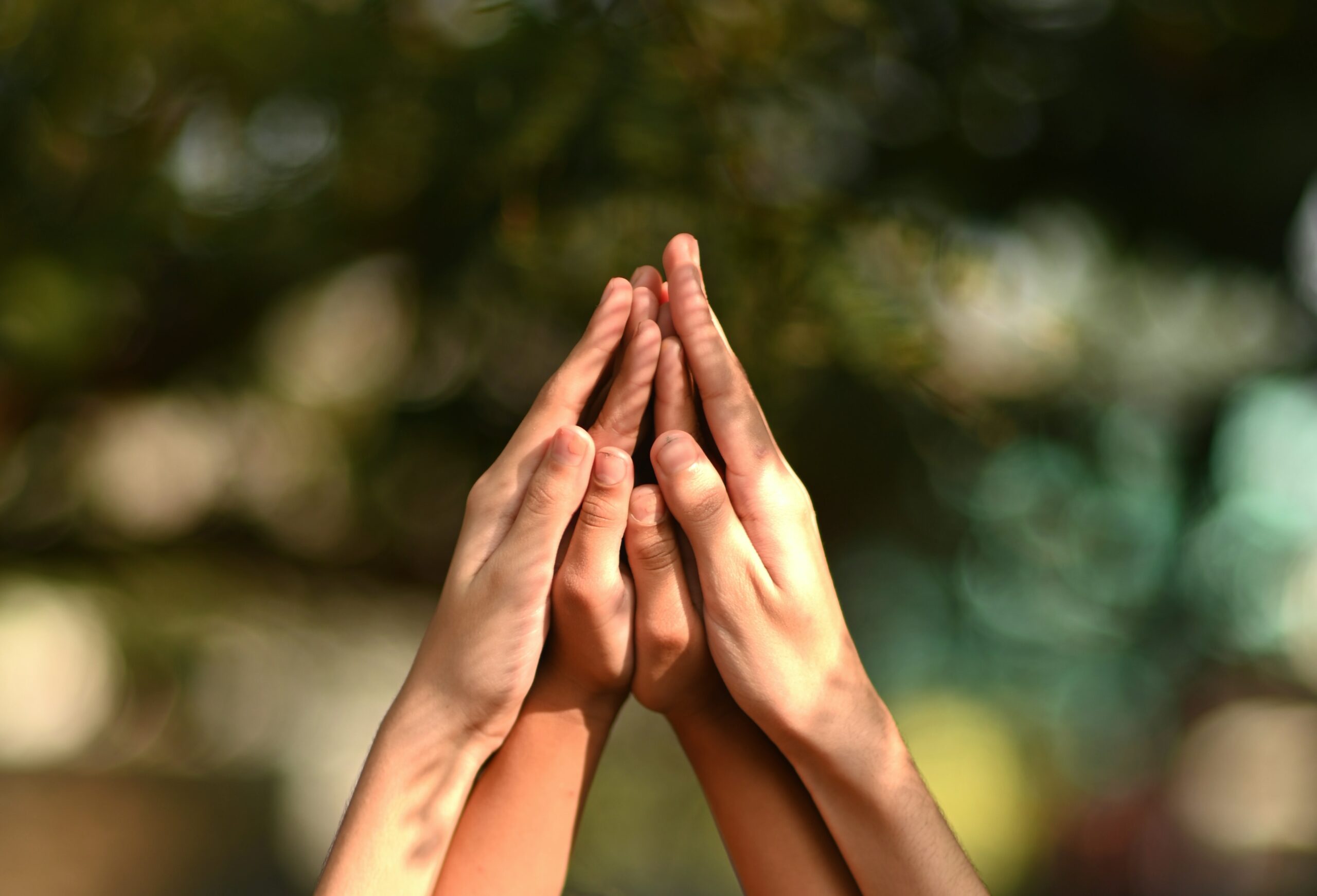 persons hand forming heart